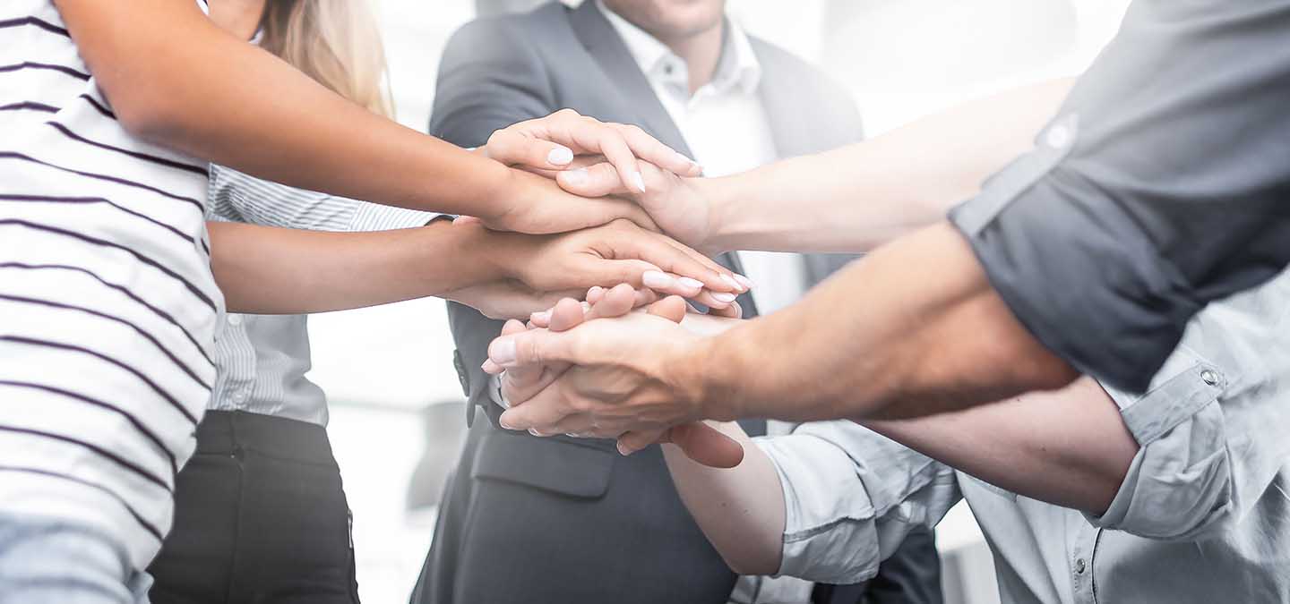 Stack of hands. Unity and teamwork concept.